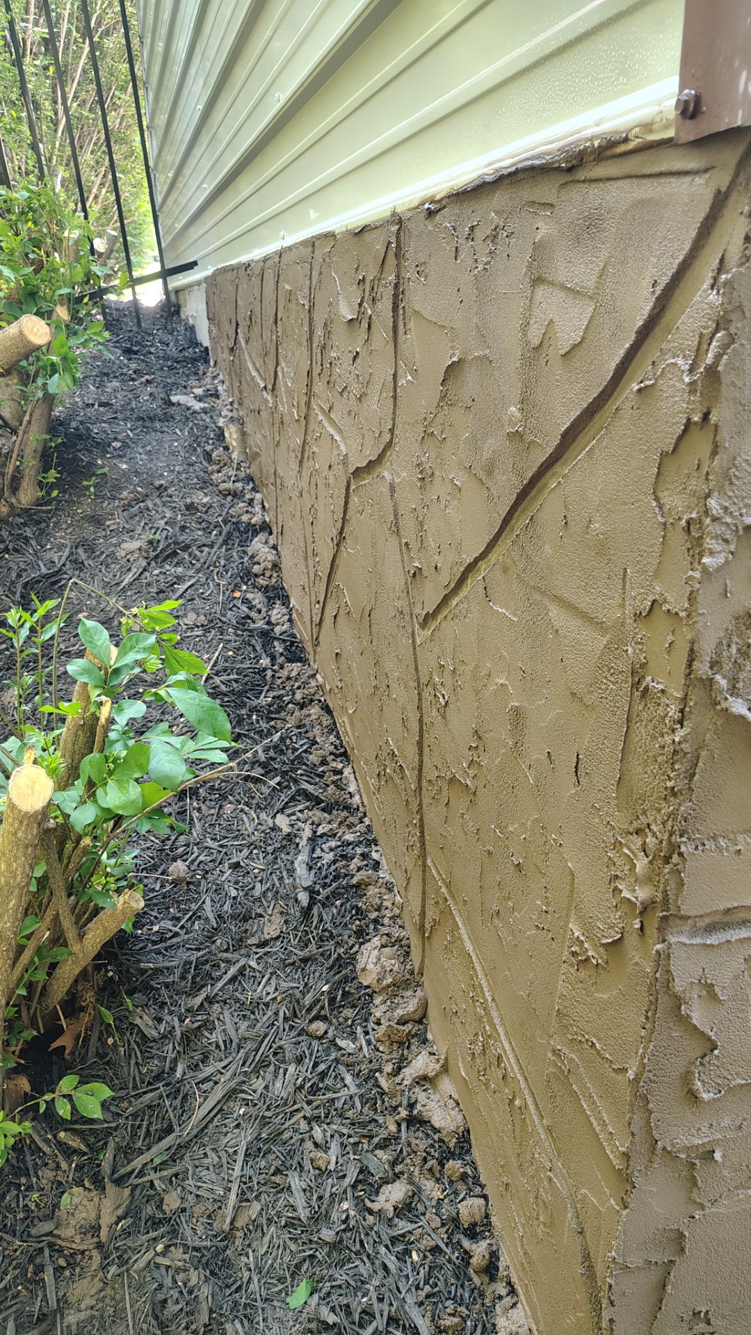 Foundation stucco finish work