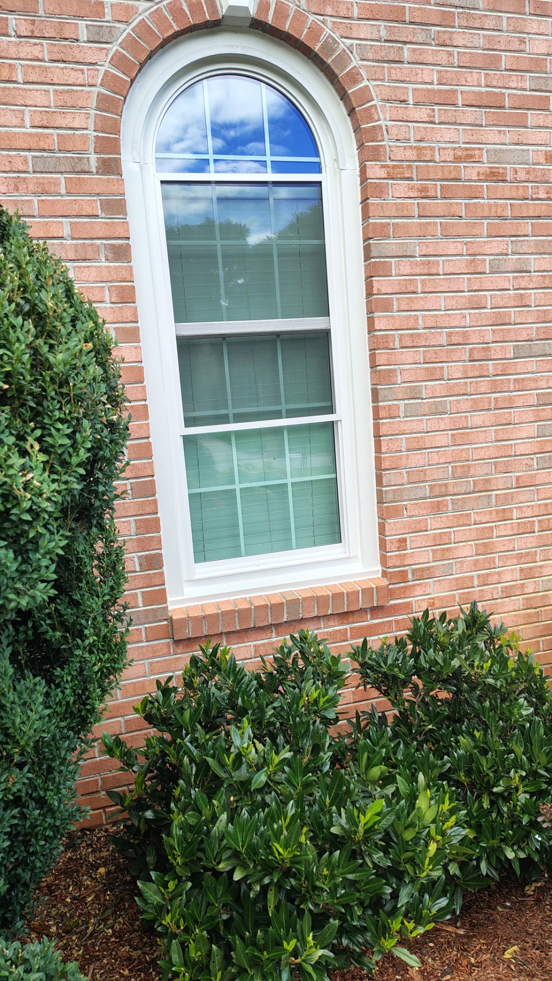 Arched brick window replacement